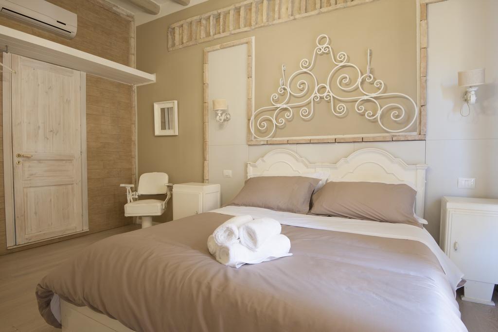 Cento Suites Cagliari Szoba fotó