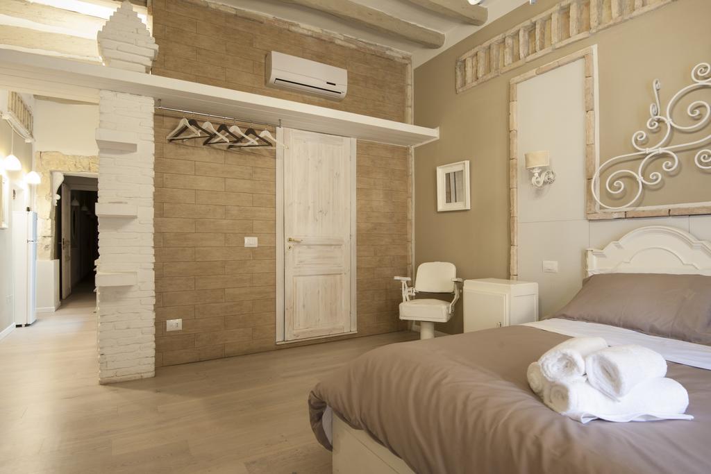 Cento Suites Cagliari Szoba fotó